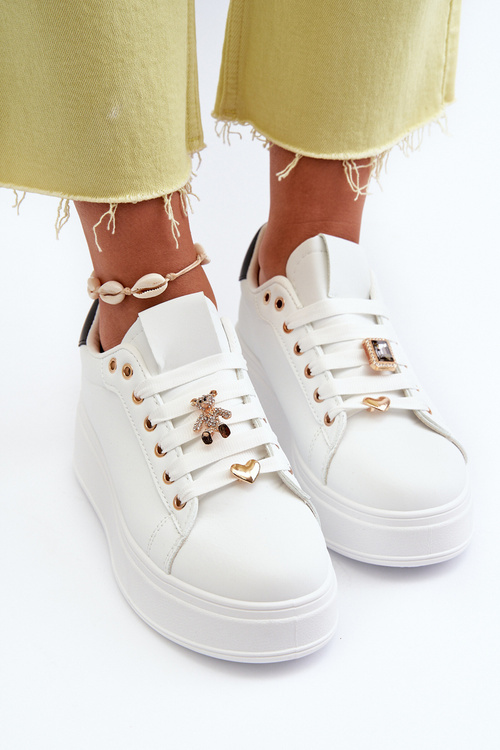 Жіночі кросівки на платформі з білими прикрасами Herbisa