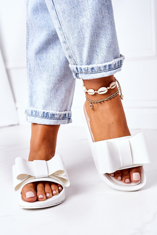 Гумові тапочки з бантом білі квітня