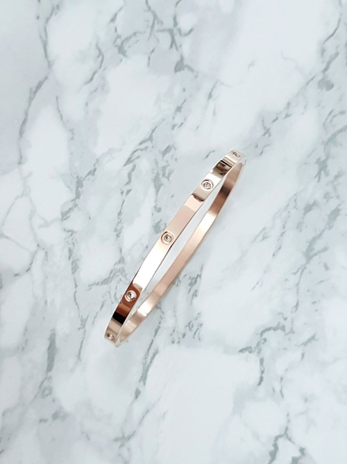 Жіночий сталевий браслет з цирконами 4мм з рожевого золота Valerii