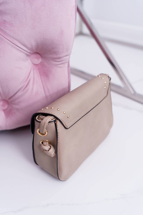 Жіноча сумочка комод золоті заклепки бежева