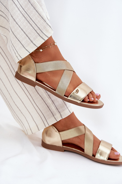 Жіночі плоскі сандалі з еластичними ремінцями золоті Marinea