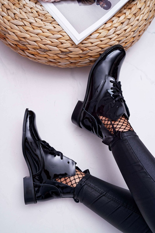 Жіночі чоботи на плоскому каблуці лаковані чорні Nicole 2420