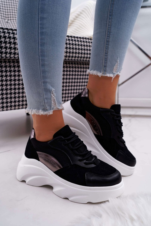 Спортивне жіноче взуття на товстій підошві чорного кольору