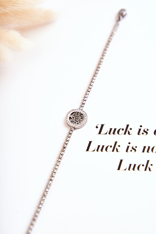 Одинарний жіночий браслет з орнаментом і фіанітами зі срібла