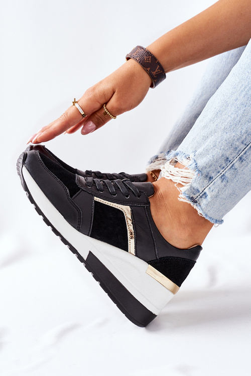 Жіночі шкіряні кросівки на танкетці чорно-білі Manitoba