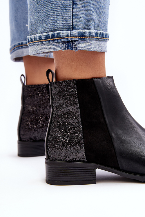 Жіночі ботильйони на плоскому каблуці з паєтками чорного кольору Messio