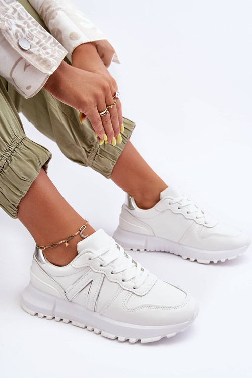 Жіноче шкіряне спортивне взуття білого кольору Kabama