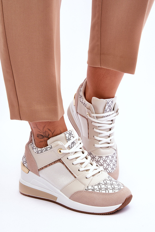 Жіночі шкіряні спортивні туфлі на танкетці білі Catrine