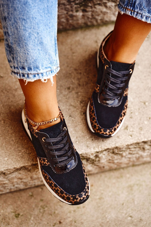 Жіноче спортивне взуття Кросівки шкіряні чорно-білі Metronus