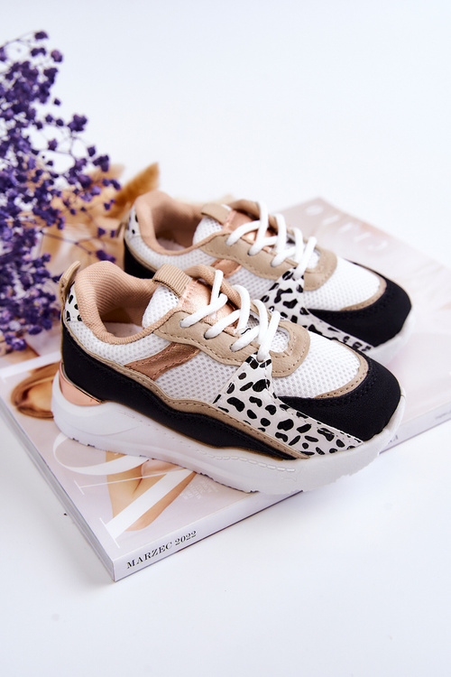 Дитяче спортивне взуття Кросівки біло-чорні Kizzie