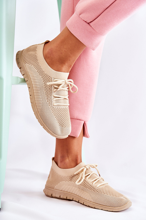 Жіноче спортивне взуття бежевого кольору Sequro