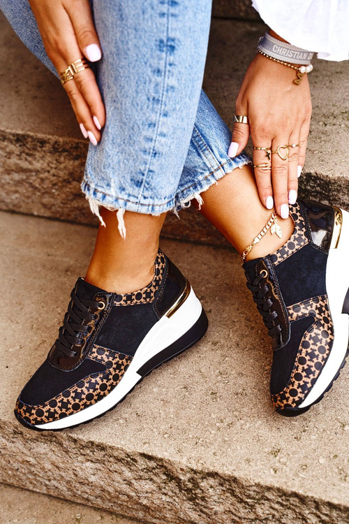 Жіноче спортивне взуття Кросівки шкіряні чорно-білі Metronus