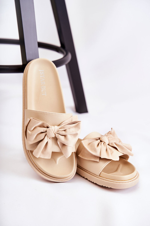 Класичні жіночі шкіряні тапочки з бантом бежеві Dessy