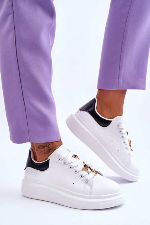 Жіноче спортивне взуття на масивній платформі біло-чорне Chante