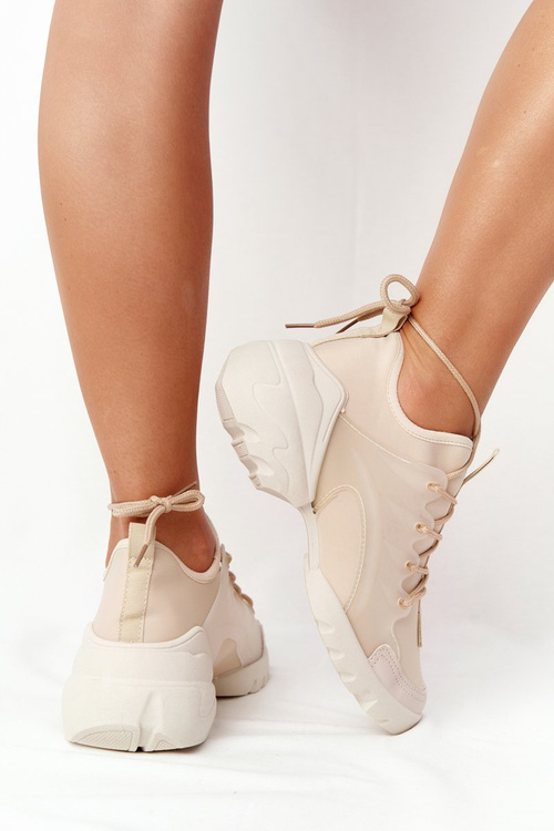 Жіноче спортивне взуття Кросівки бежевого кольору Born This Way