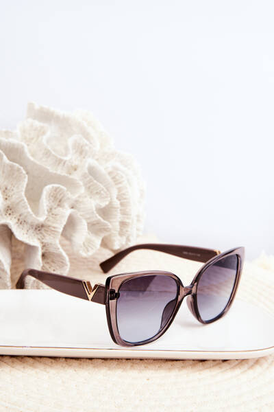 Фіолетові жіночі сонцезахисні окуляри