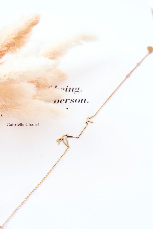 Святковий браслет ковтає золото