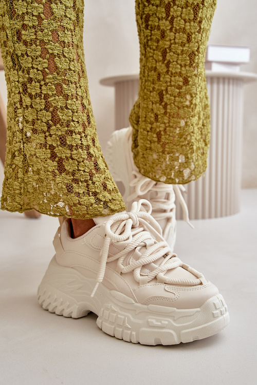 Жіночі кросівки на масивній підошві світло-бежевого кольору Nevela