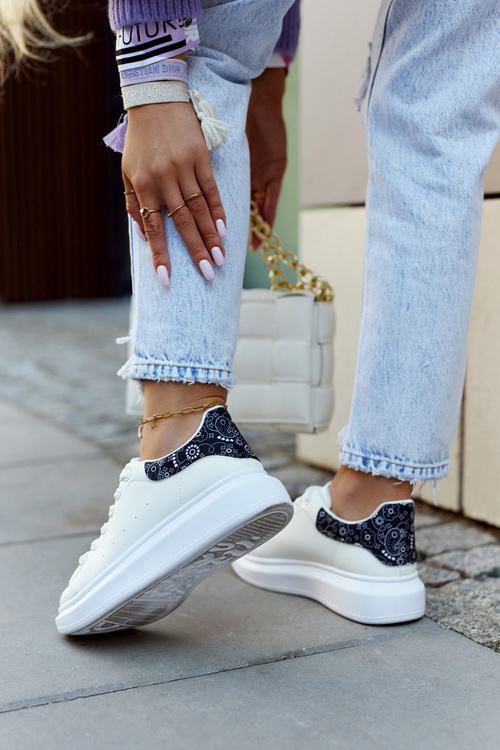 Класичне жіноче спортивне взуття біло-чорного кольору Meleris