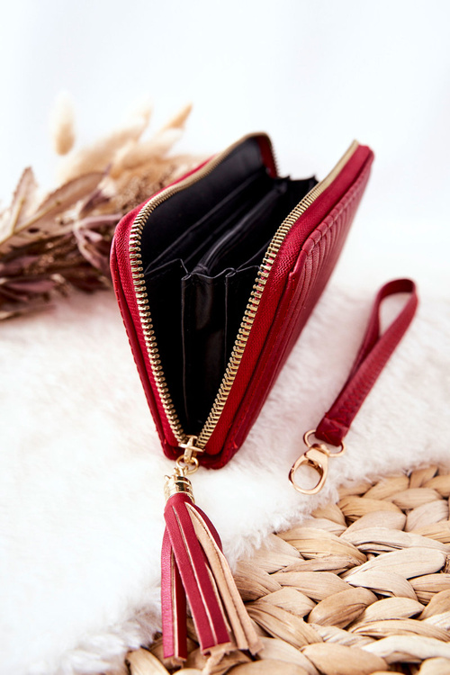 Великий стьобаний гаманець з ремінцем червоного кольору