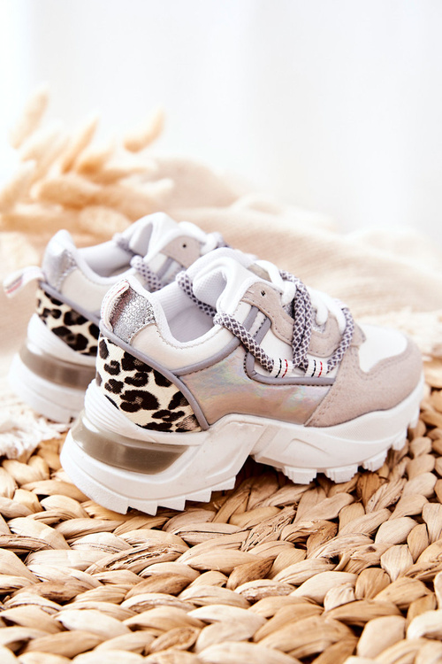 Дитяче спортивне взуття Кросівки білі Rommie