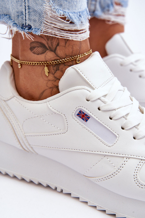 Шкіряне спортивне взуття на платформі білого кольору Merida