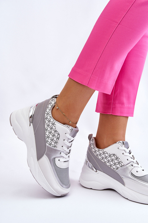 Жіноче спортивне взуття на платформі біло-сіре Ferrina
