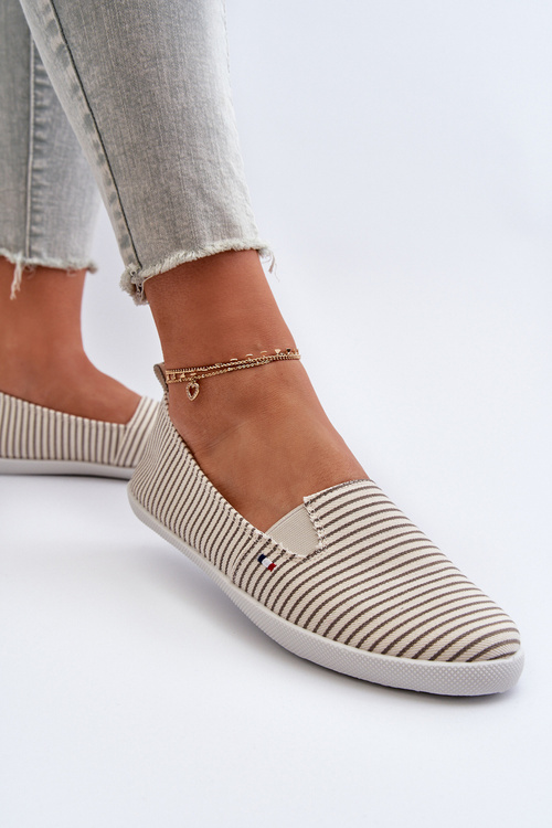 Жіночі кросівки в смужку бежевого кольору Pazaria