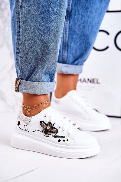 Жіноче спортивне взуття Кросівки з мушкою білого срібла Amour