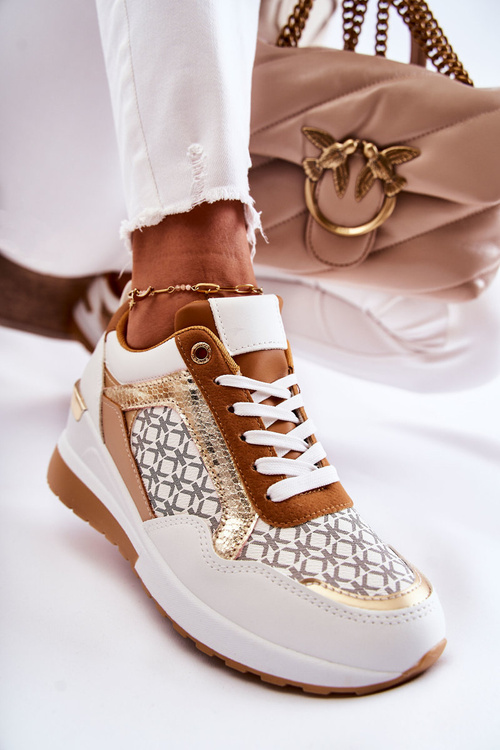 Жіночі шкіряні спортивні туфлі на танкетці білі Catrine