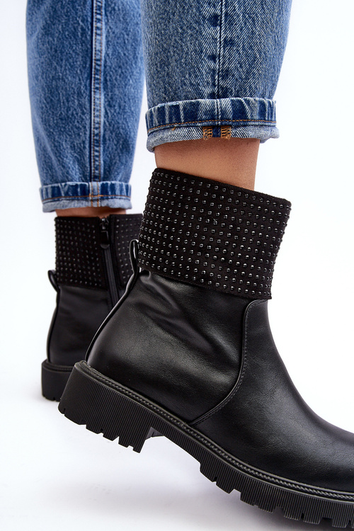 Жіночі чоботи на плоскій підошві з прикрасами чорного занідіту