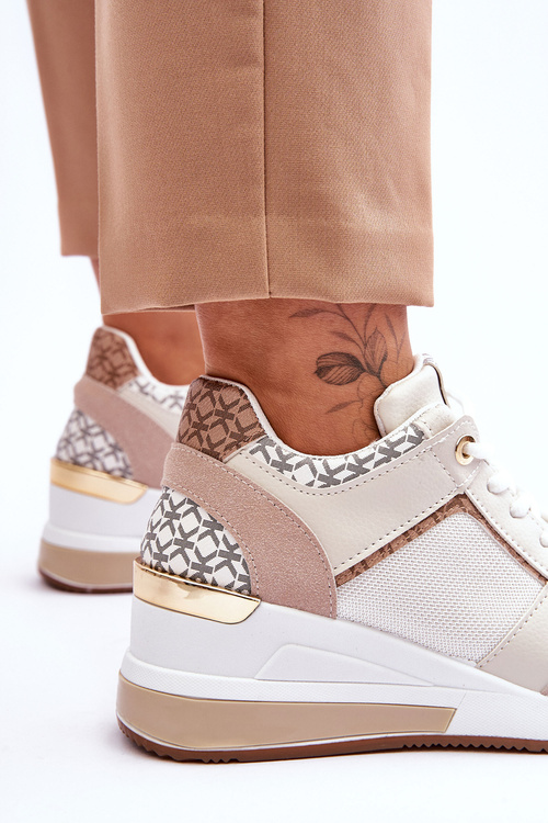 Жіночі шкіряні спортивні туфлі на танкетці білі Catrine