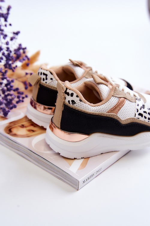 Дитяче спортивне взуття Кросівки біло-чорні Kizzie