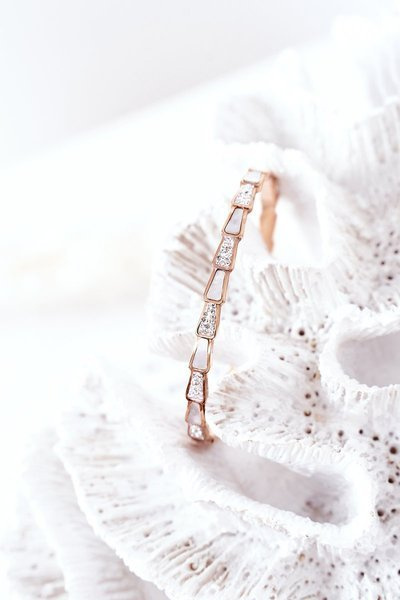 Сталевий браслет із кубічним цирконієм і перламутровим рожевим золотом