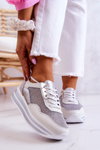 Жіноче спортивне взуття Кросівки біло-сріблясті Bourne