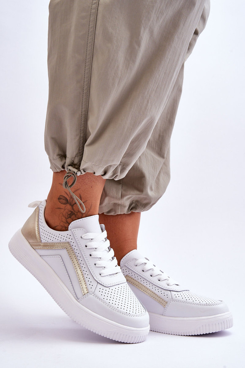 Жіноче шкіряне перфороване спортивне взуття біло-золотого кольору Carvalo