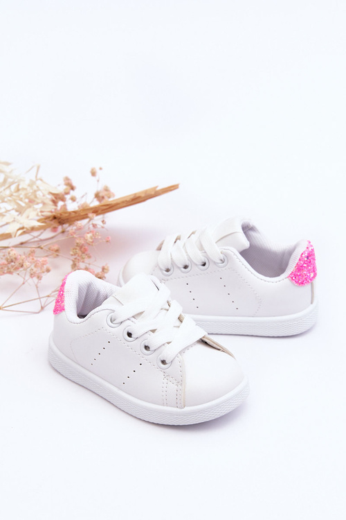Дитяче спортивне взуття білого та неоново-рожевого глянцевого кольору