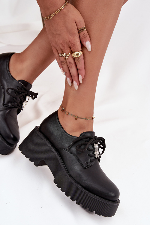 Жіночі мокасини з пряжкою з еко-шкіри чорні Laurea