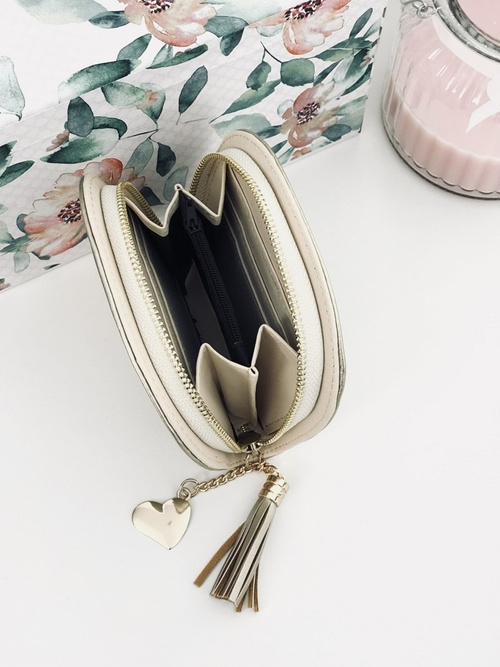 Золотий жіночий гаманець з китицею