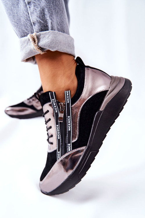 Шкіряне спортивне взуття Кросівки чорного та сріблястого кольору