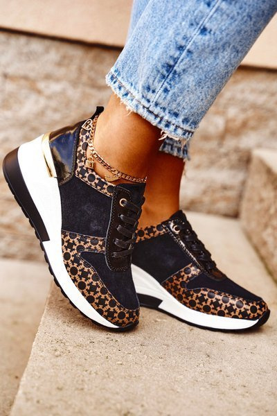 Жіноче спортивне взуття Кросівки шкіряні чорно-білі Metronus