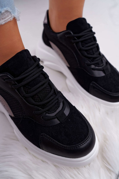 Спортивне жіноче взуття на товстій підошві чорного кольору
