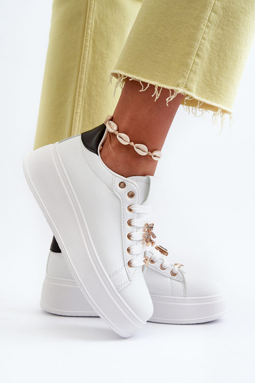 Жіночі кросівки на платформі з білими прикрасами Herbisa