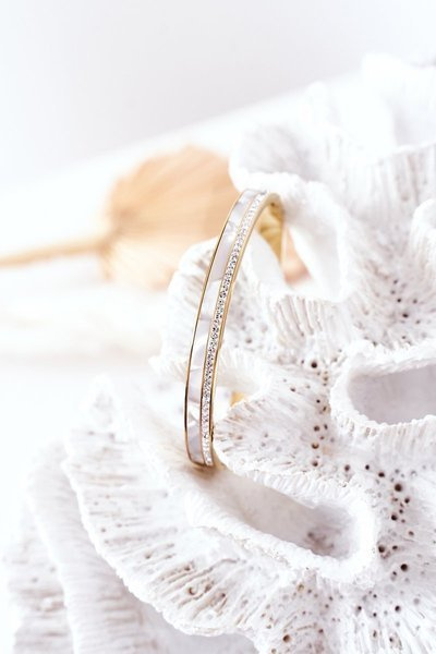 Сталевий браслет з кубічним цирконієм і перламутровим золотом