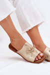 Жіночі плоскі сандалі з декоративним зав'язуванням золоті Norela