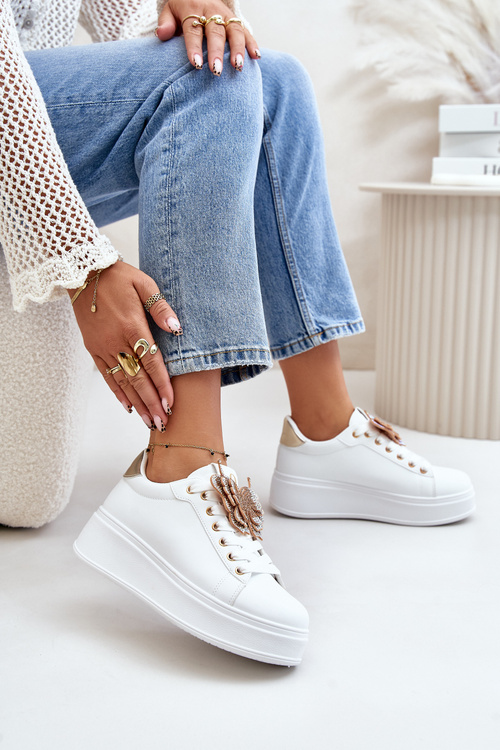 Жіночі кросівки на платформі з біло-золотим нарітевієм у вигляді метелика