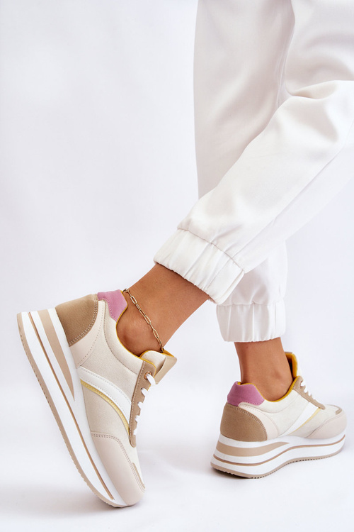 Бежеві кросівки на танкетці Hermain