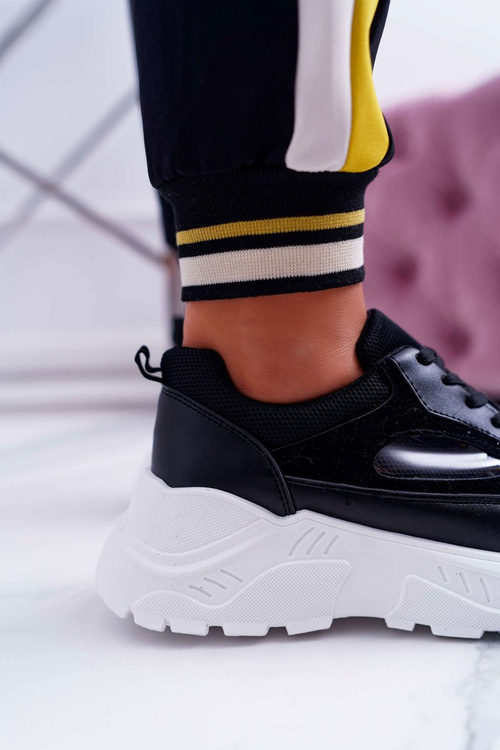 Спортивне жіноче взуття на товстій підошві чорного кольору HighStep