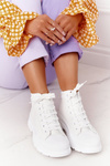 Жіночі шкіряні кросівки на масивній підошві білого кольору Trissy