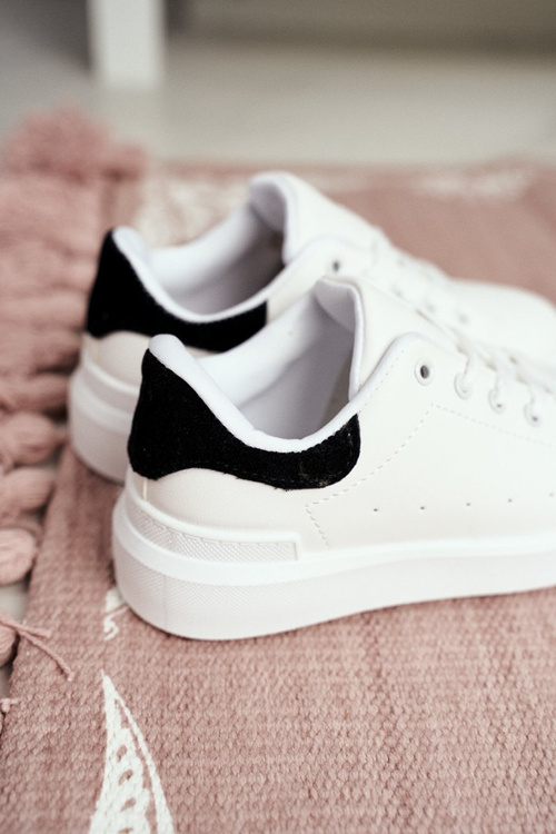 Дитяче спортивне взуття Кросівки біло-чорні Bilbo